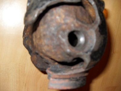 water jacket extends right around the spark plug area. difficult to get at but stiff wire helps for those hard to reach areas.