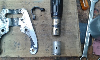 Solid plug inserted into the tiller.jpg