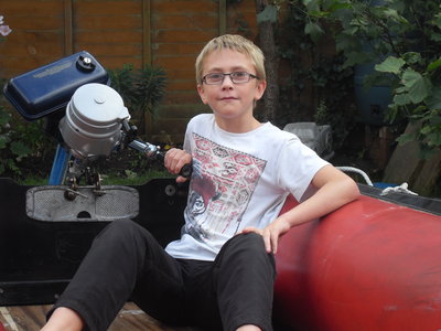 A very chuffed nearly 12 year old with HIS boat