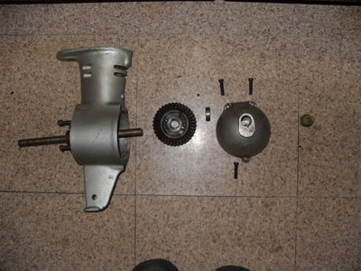 difficult to see in the pics but between the gear and the front cover is a very thick washer,almost the same size as a collar.